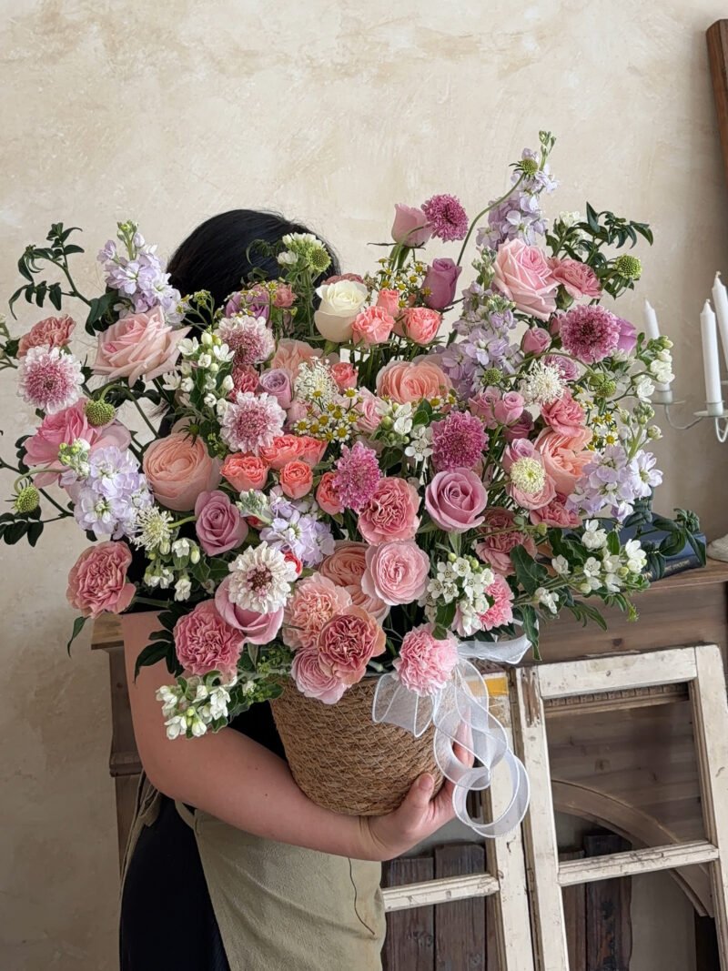 Large Blushing Garden flower box held by a florist for size reference