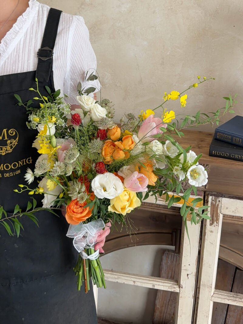 Full view of Summer Garden bridal bouquet with vibrant seasonal flowers and foliage